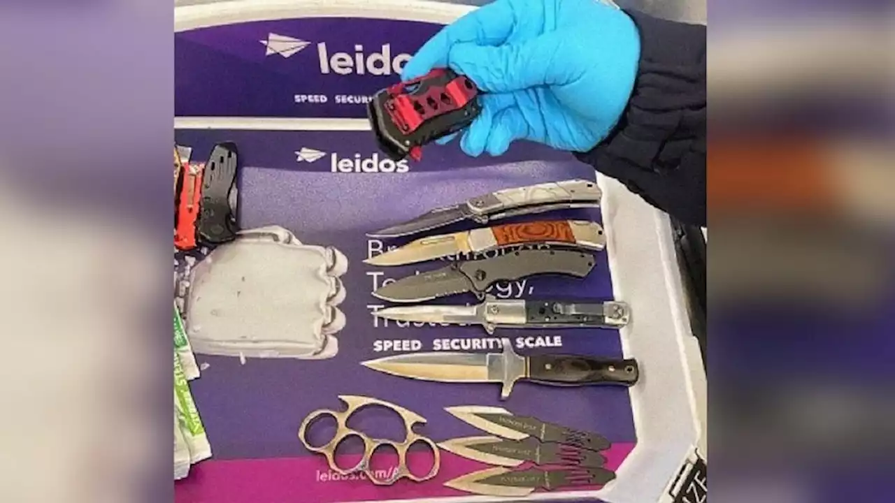 Man cited after TSA agents find 23 weapons packed inside carry-on bag