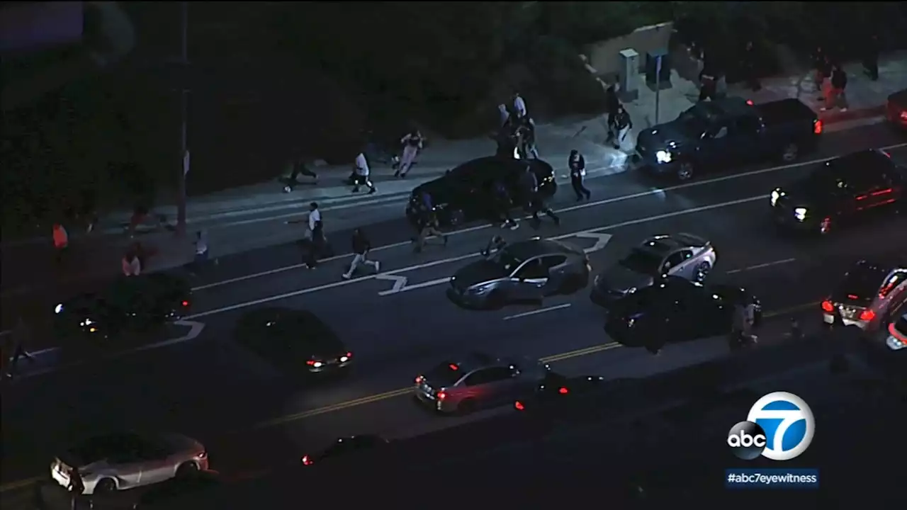 Dozens flee after police arrive to shut down street takeover in the San Fernando Valley - Video