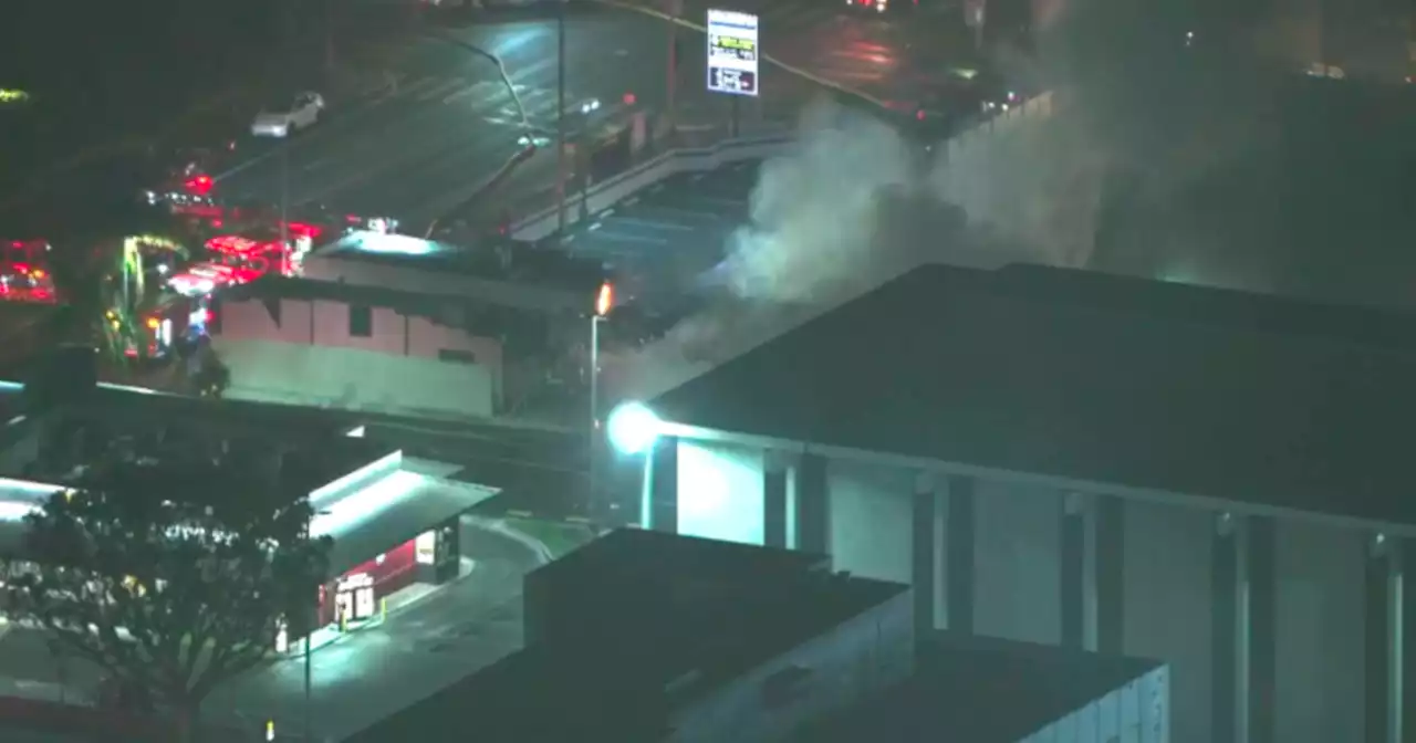 Vacant building fire threatens nearby structures in Koreatown before knock down