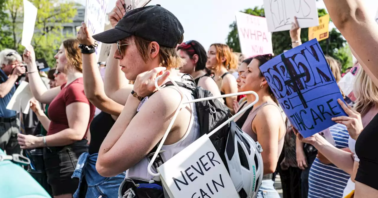 TikTokers are sending hangers to the Supreme Court. Abortion rights activists say that goes too far.