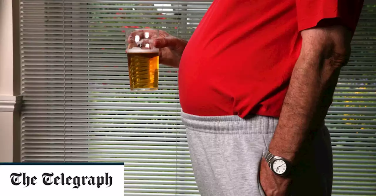 Overweight people ‘should have lower drinking limits’ to cut cancer risk