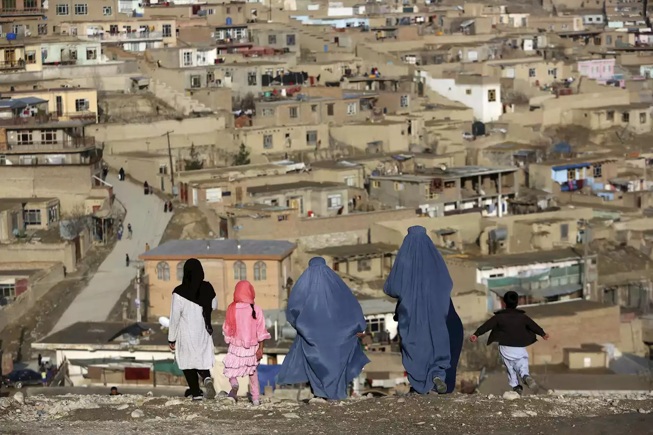 Afghanistan's Taliban order women to cover up head to toe