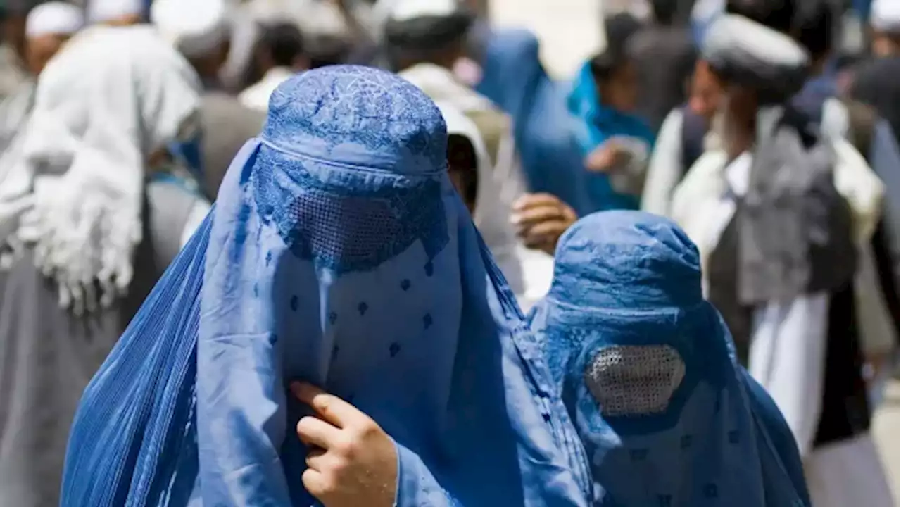 Afghanistan's Taliban order women to wear burka in public | CBC News