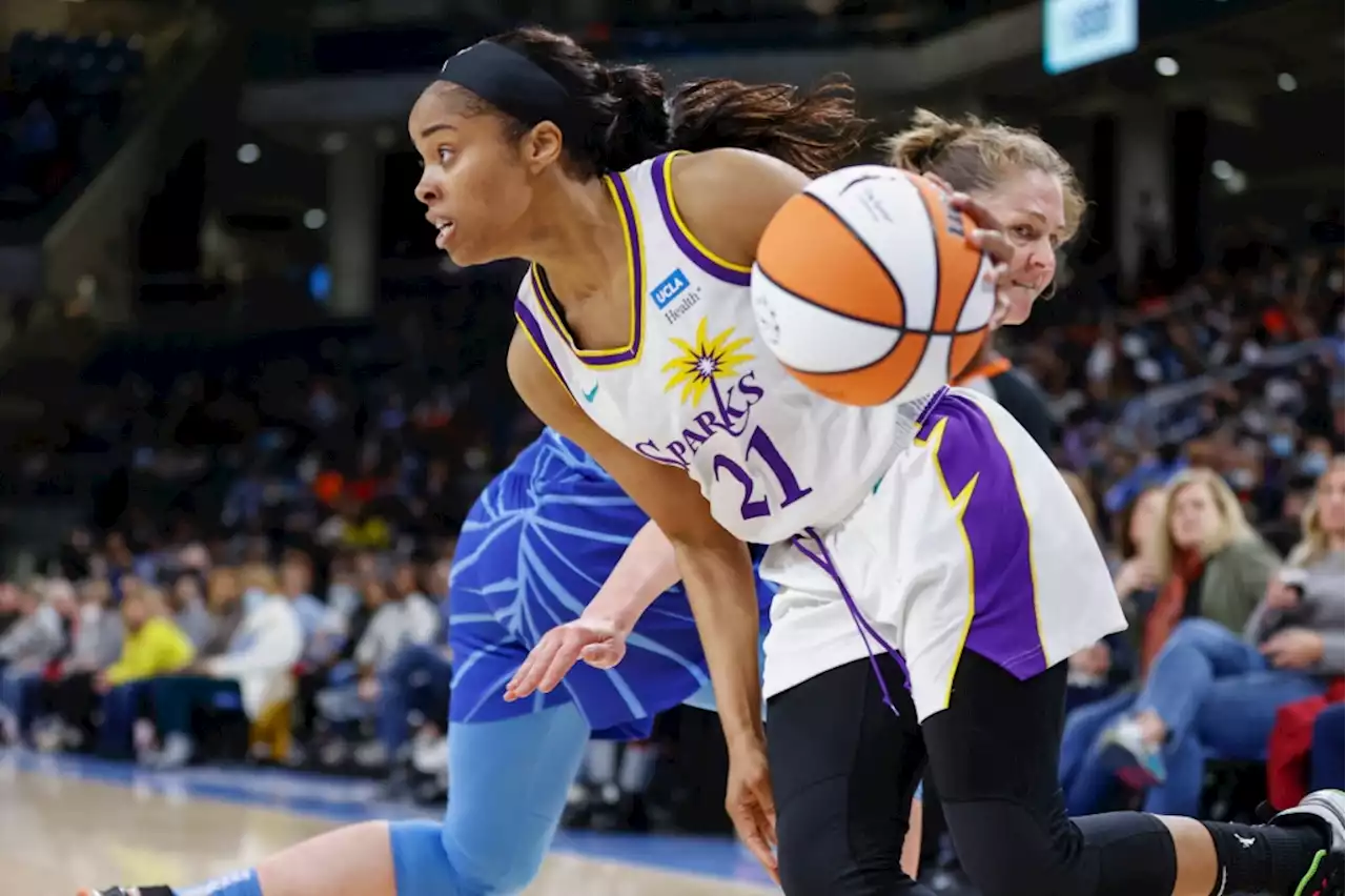 Jordin Canada leads Sparks to overtime win in Chicago in season opener