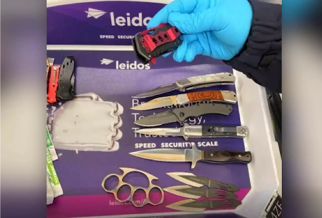 TSA catches man with 23 weapons in carry-on at DC airport