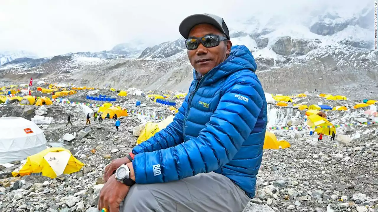 Nepali Sherpa breaks his own record again by scaling Everest 26 times, official says