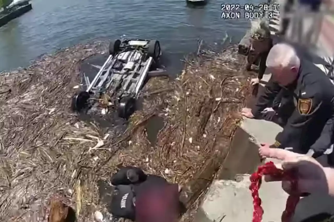 New Jersey police rescue woman from SUV submerged in Delaware River