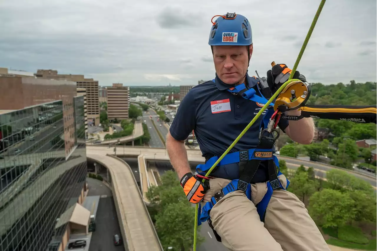 A bold jump off a building, 160 feet up, to fight homelessness