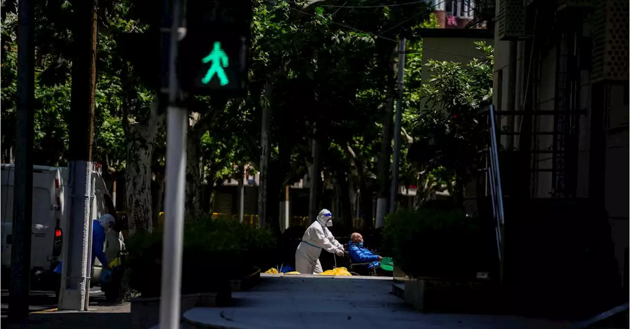 Shanghai tightens lockdown to hit zero-COVID goal by late May - sources