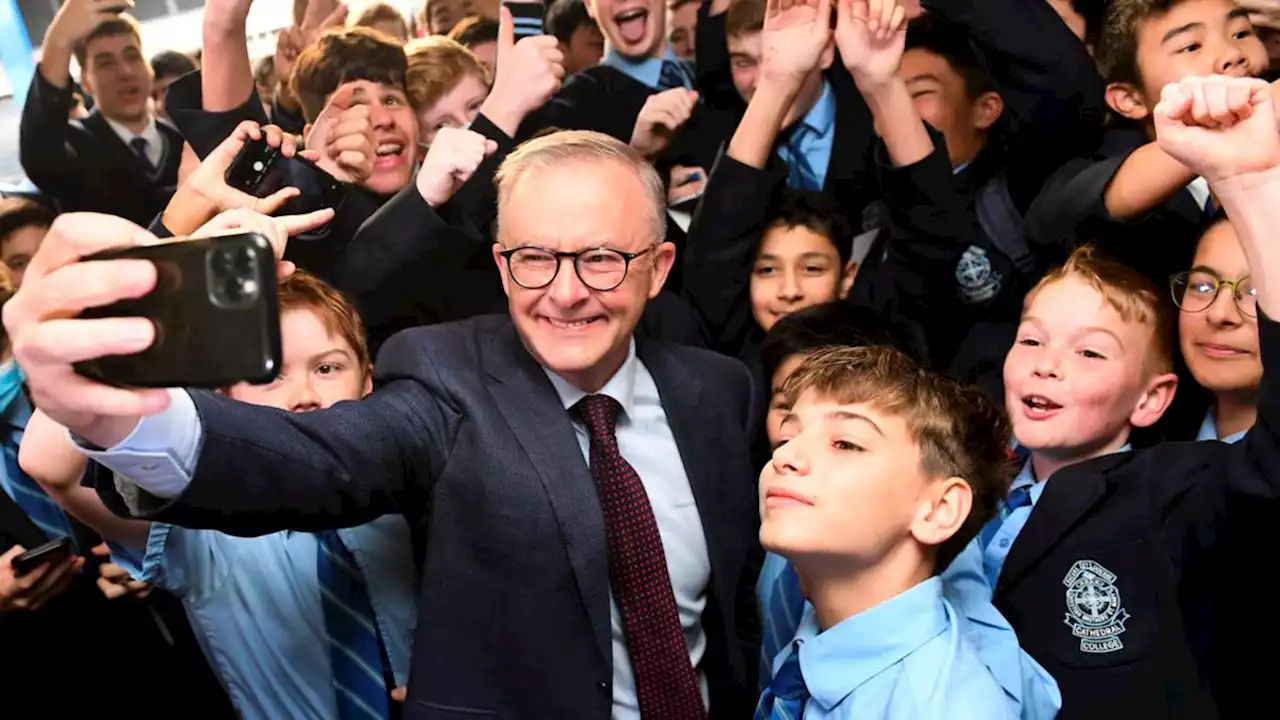 Albanese mobbed by students during rock star welcome on return to his high school