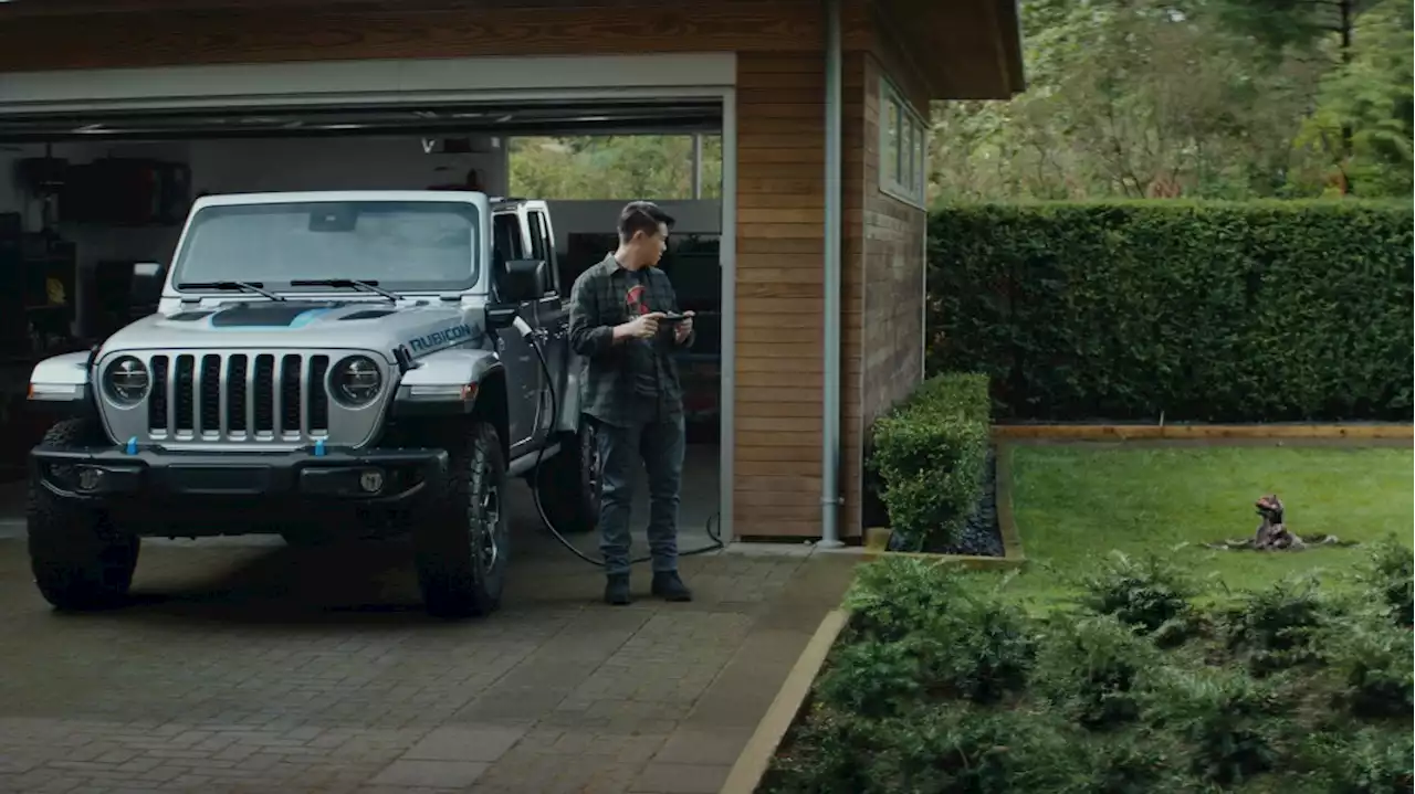 Jeep ad features new Jurassic World dinosaur and 4xe models