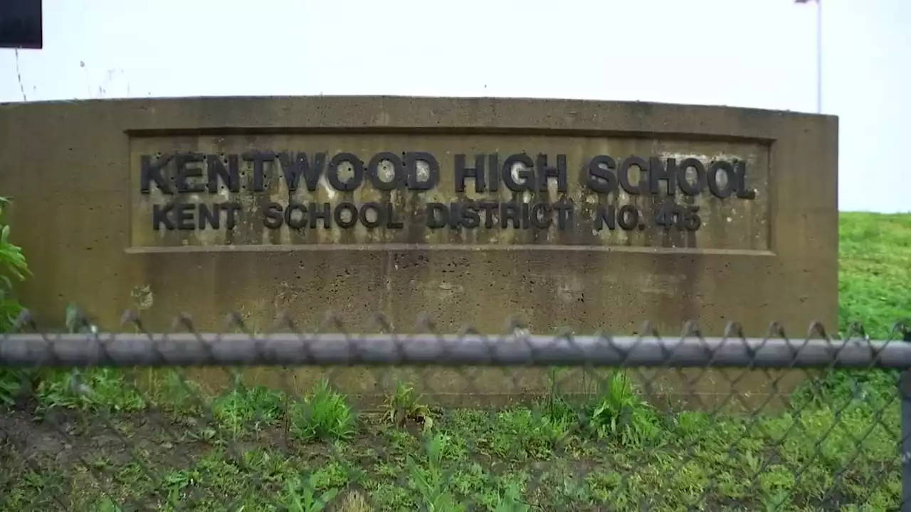 Kentwood High School staff member arrested