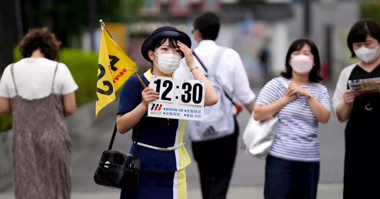 Japan eases foreign tourism ban, allows guided package tours