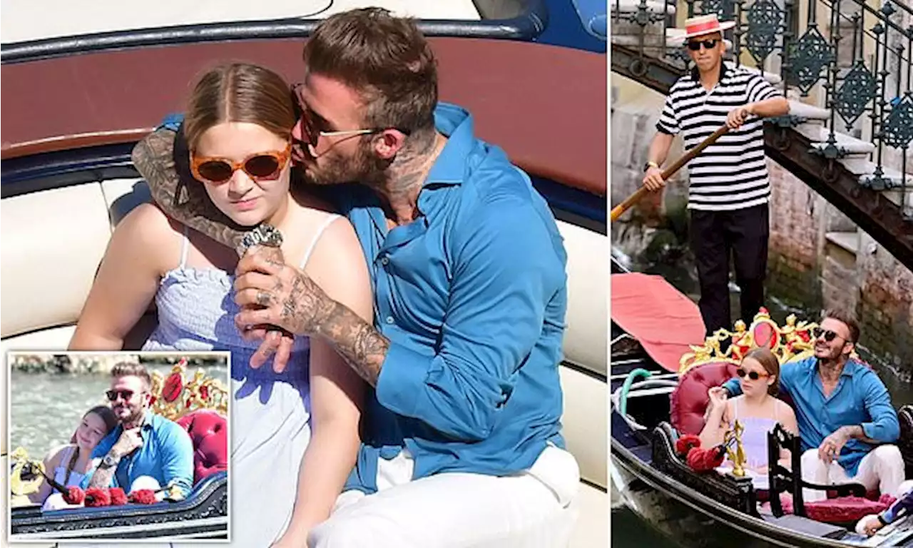 David Beckham dotes on daughter Harper during a gondola ride in Venice