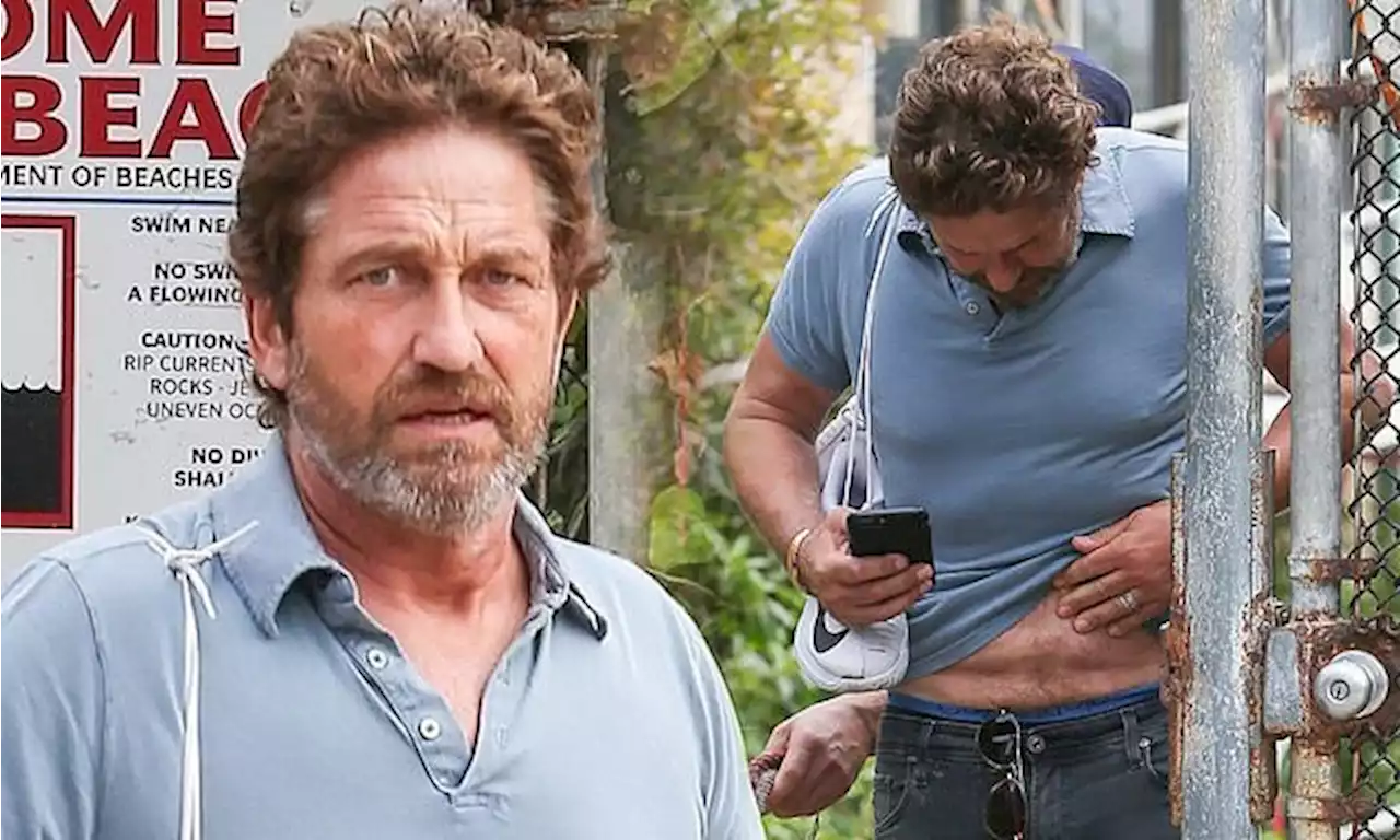 Gerard Butler, 52, flashes a glimpse of his six pack