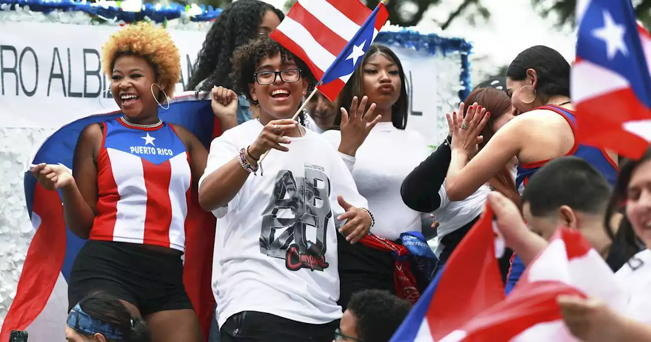 Puerto Ricans celebrate their culture with flags, food and music in Humboldt Park parade, festival