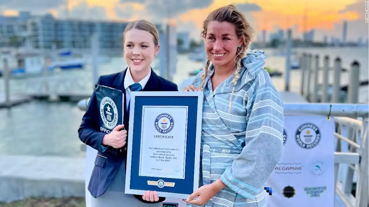 Woman sets record swimming 26.22 miles in a mermaid fin