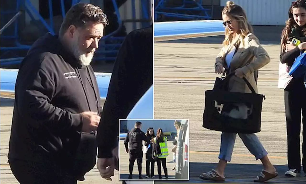 Russell Crowe, 58, and girlfriend Britney, 31, board jet in Sydney