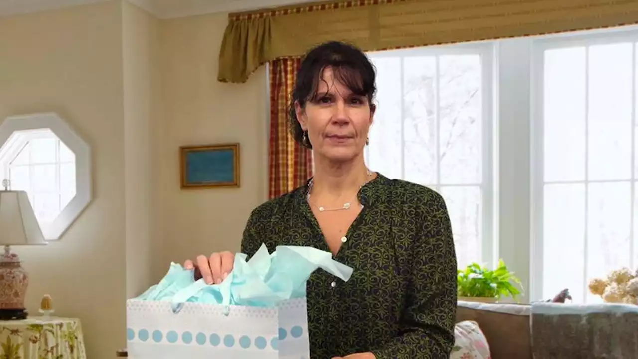 Mom Produces Decorative Gift Bag Out Of Thin Air