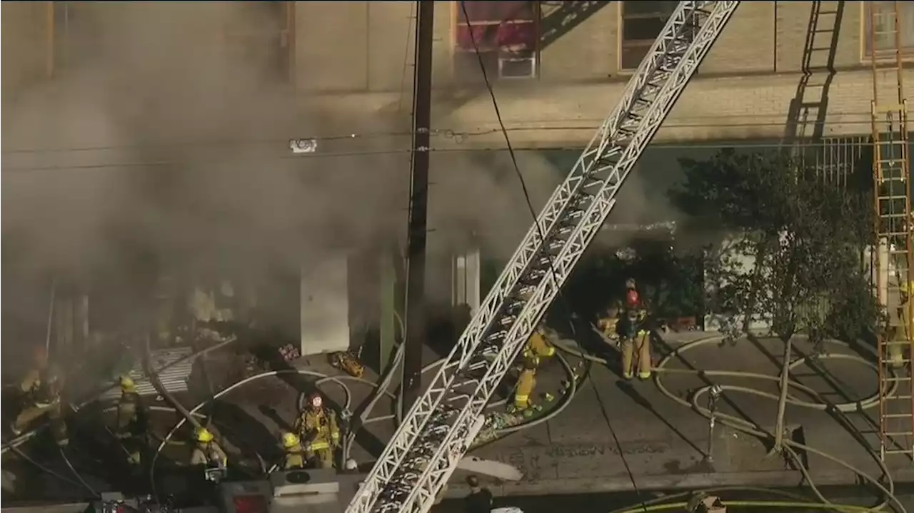 Crews put out fire in occupied commercial building in Downtown LA