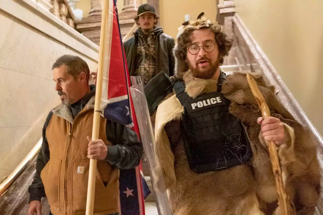 Dad who carried Confederate flag into Capitol heads to trial