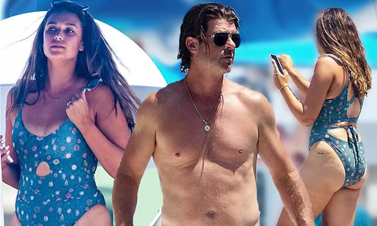 Robin Thicke EXCL: Shows off muscular body while on a yacht with wife