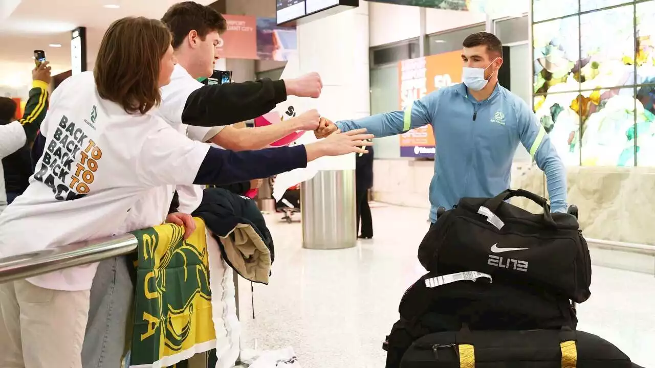 'People probably wrote us off': Socceroos open up on goalie switch, sudden-death penalty as they arrive home