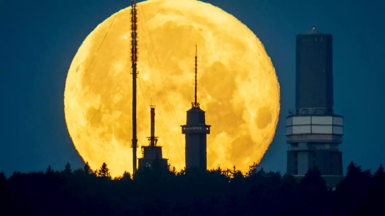 Strawberry Moon 2022: Supermoon lights up the night sky around the world - in pictures