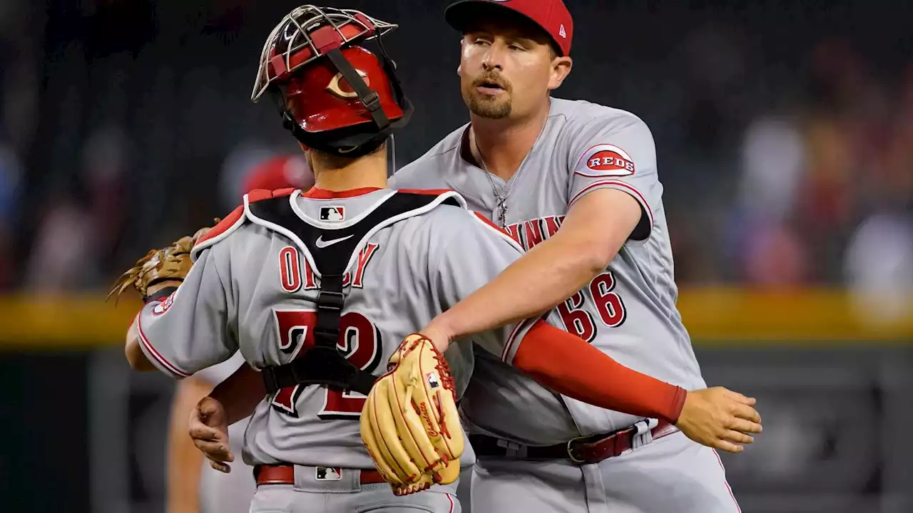 Mahle brilliant through 9, Reds beat D-backs 5-3 in 12