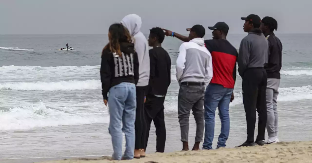 As friends and family watch, search resumes for teen drowning victim off Mission Beach