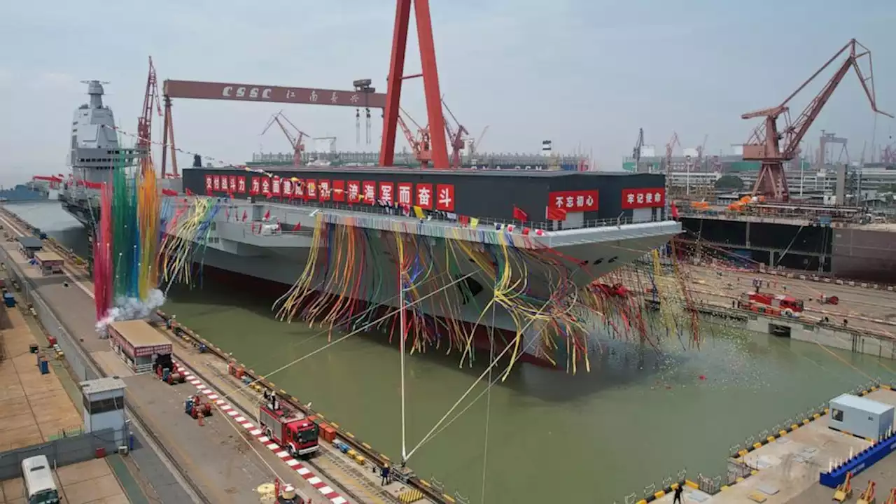 China launches high-tech aircraft carrier in naval milestone