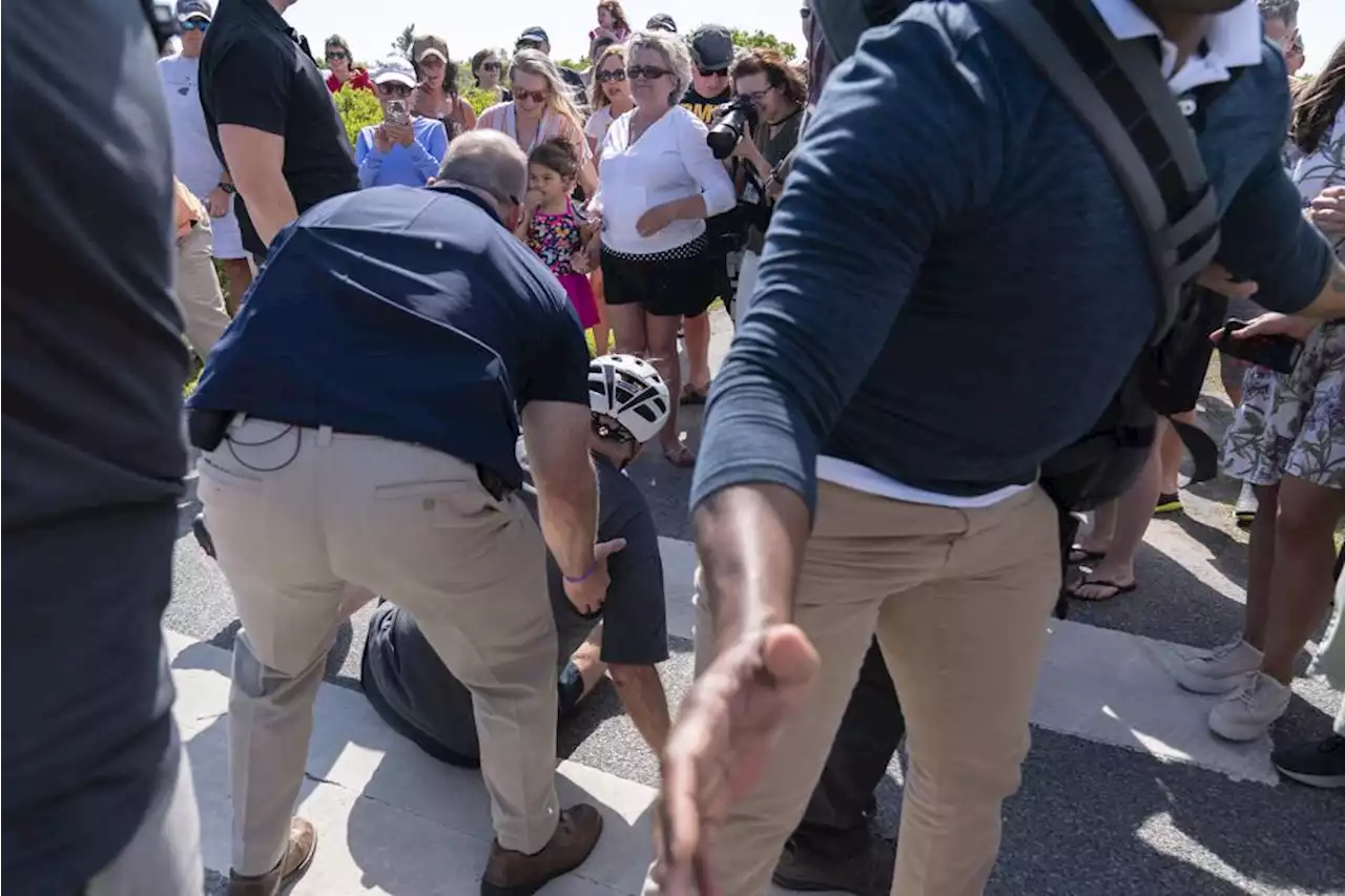 Biden falls while getting off bike after beach ride near his Delaware home