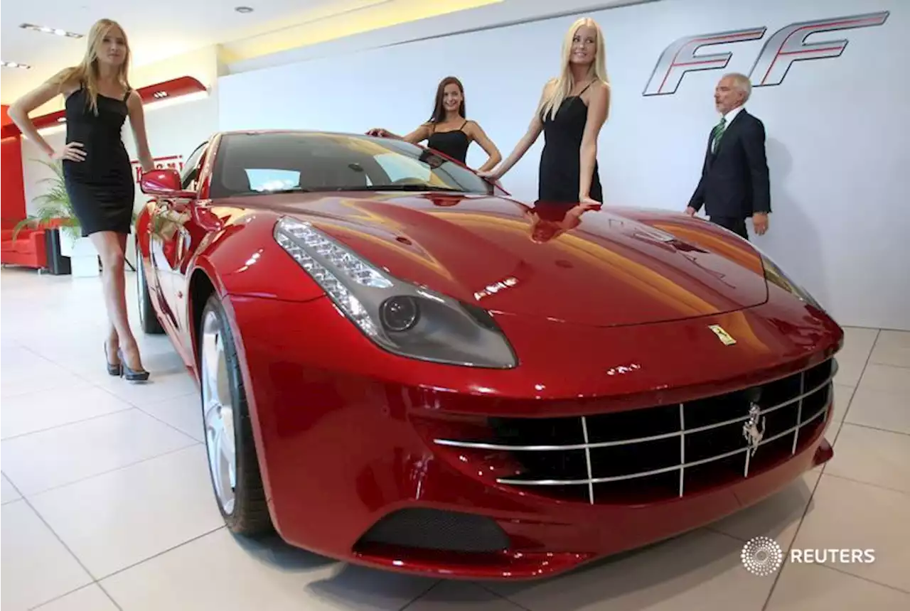 Ferrari races into a greener, pricier world