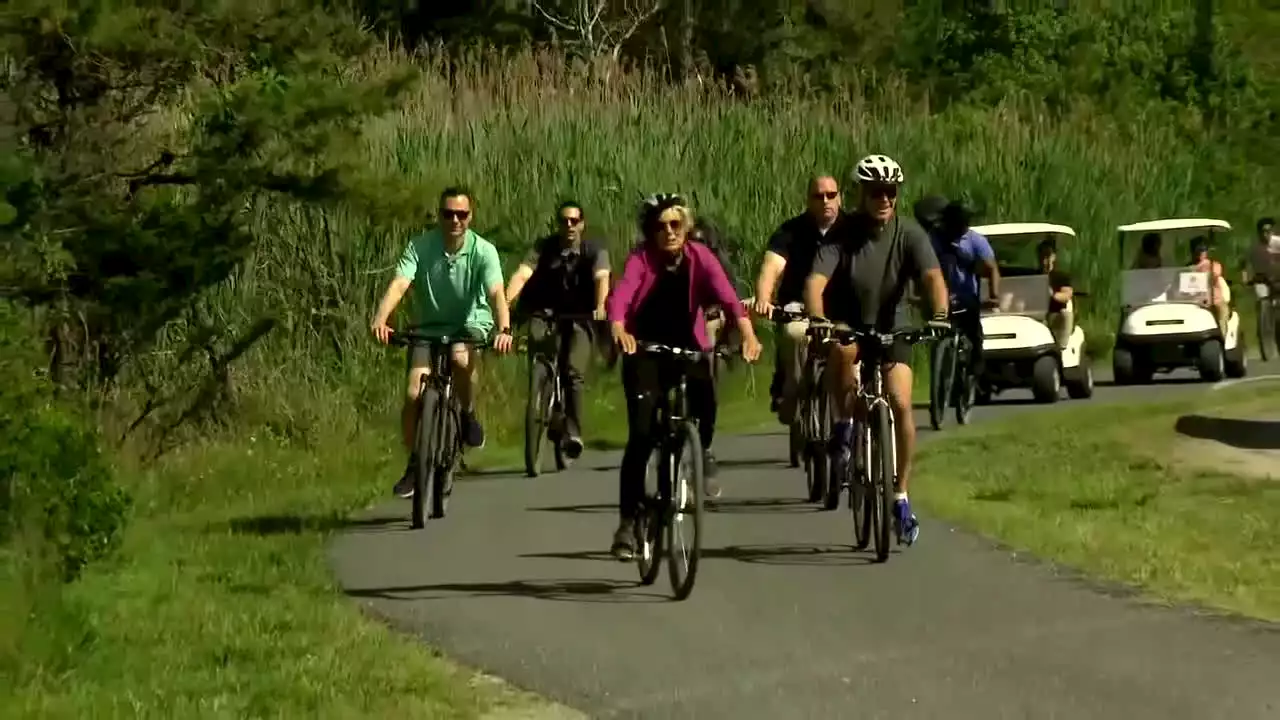 Video: Biden says 'I'm good' after falling off bike in Delaware