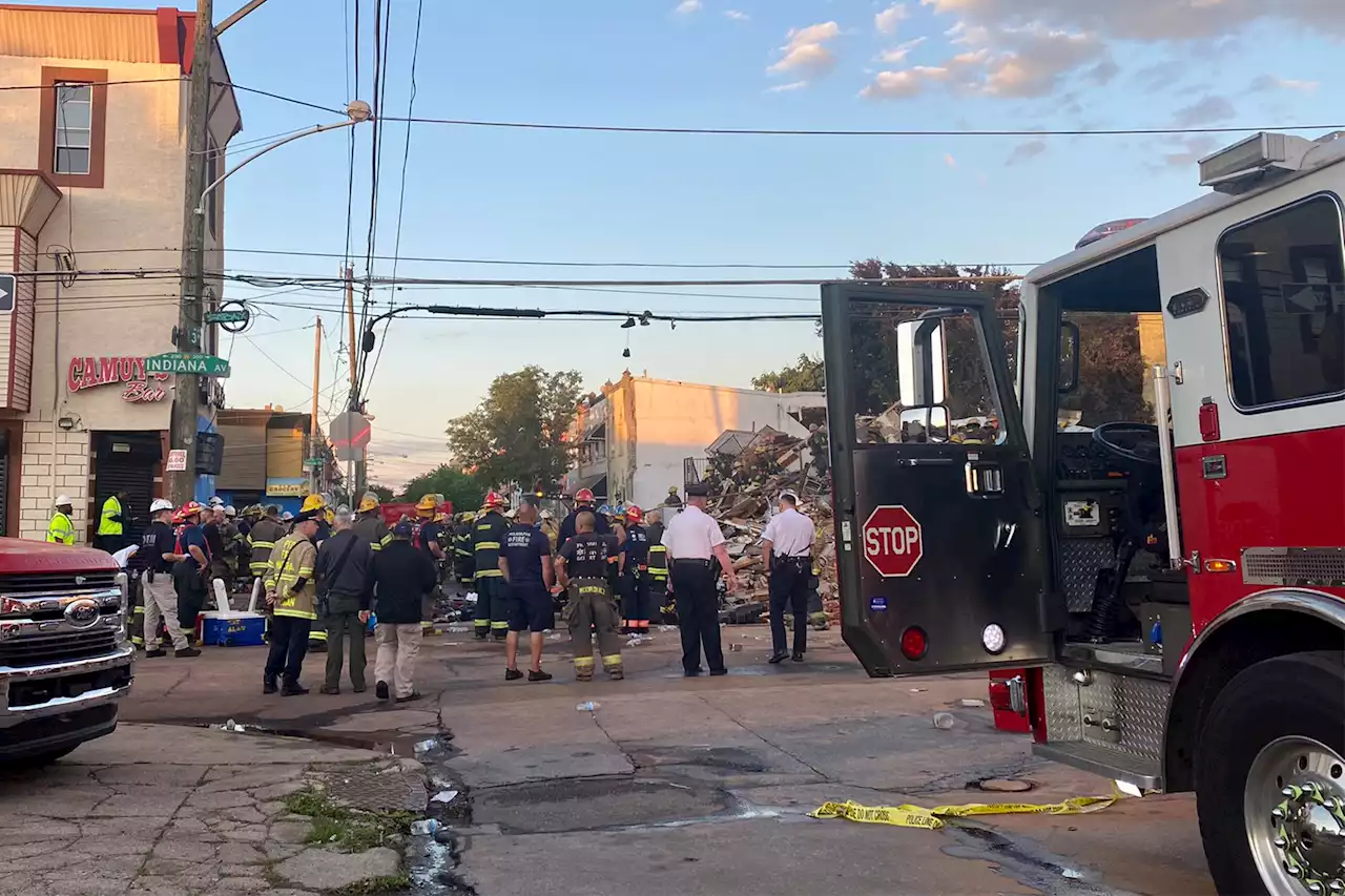 Firefighters trapped in debris after building collapses in Philadelphia