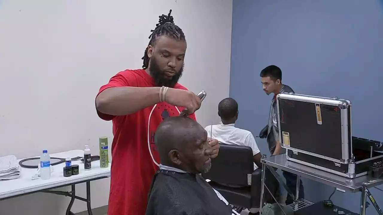 Barbershop provides homeless men haircuts and shave in honor of Father's Day