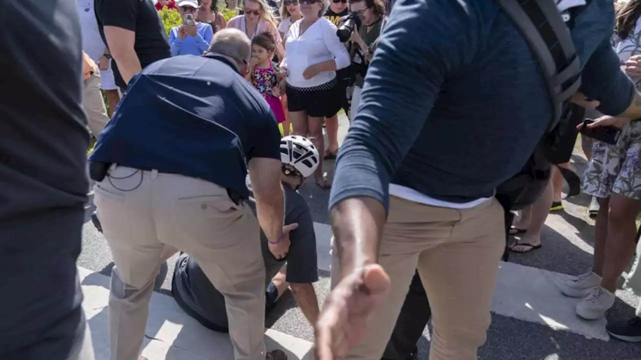 Biden falls while getting off bike after beach ride near his Delaware home