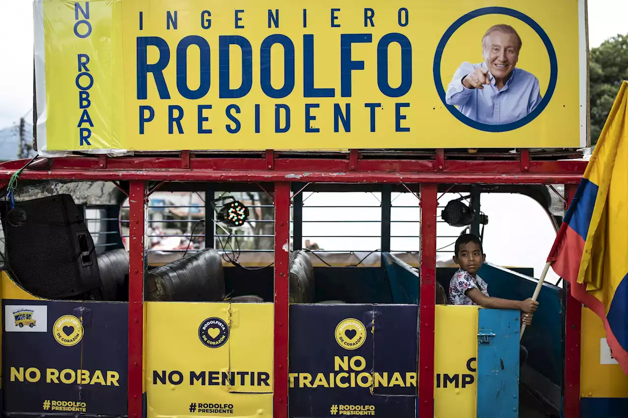 Tight Colombian runoff pits former rebel, millionaire