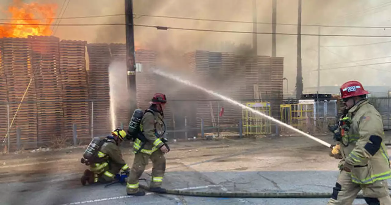 Fire crews battled large commercial fire at a San Bernardino pallet yard