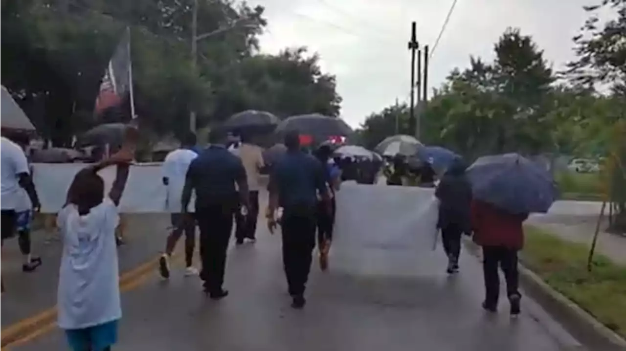 Rain doesn’t dampen spirit as community celebrates Juneteenth with annual Freedom Walk parade