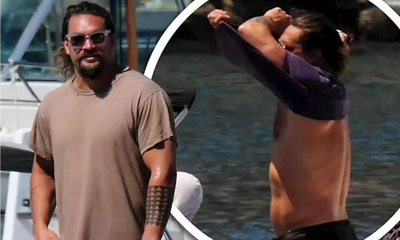 Jason Momoa looks fighting fit as he strips off for a boat ride