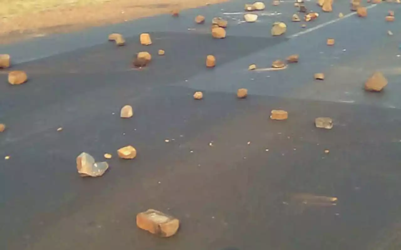 Protestors block routes into Soweto with rocks, burning tyres