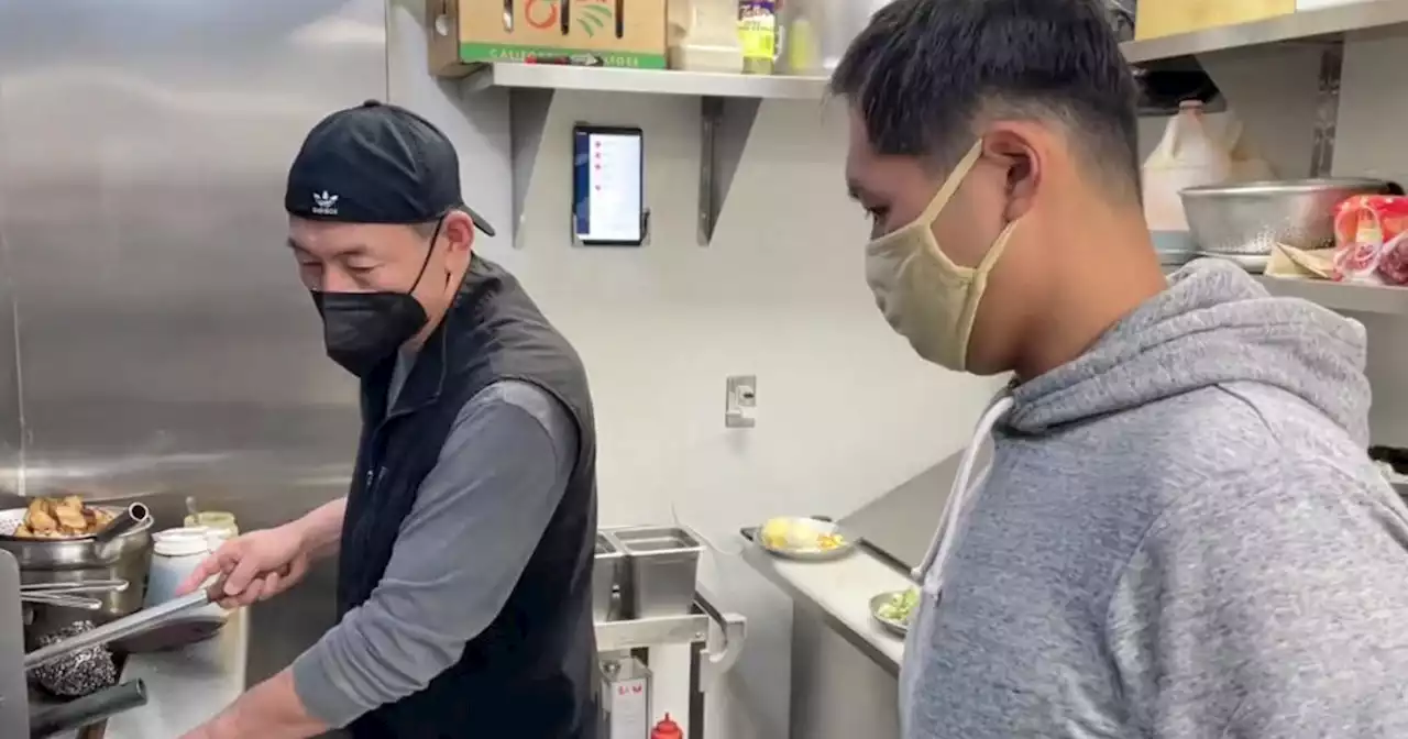 Father and son bond over hard work at 'Cozy Wok'