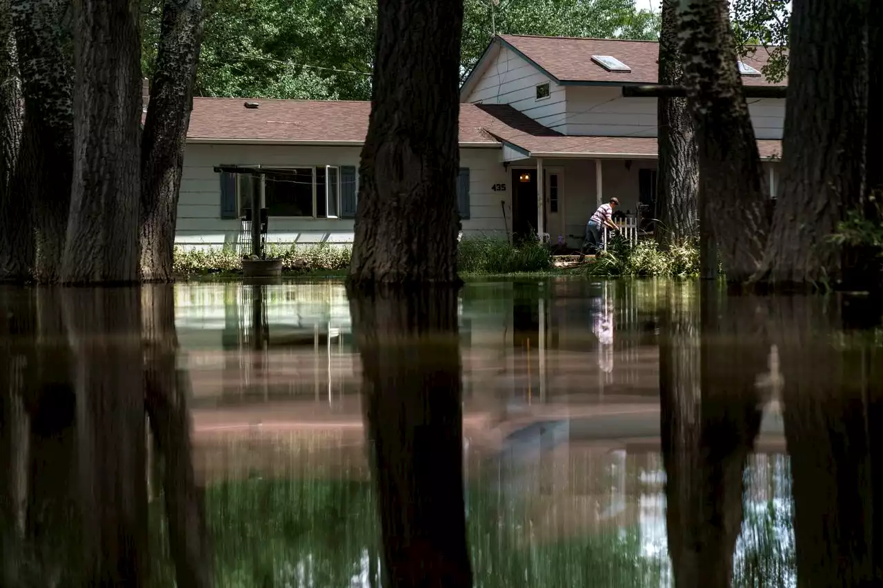 Outside Yellowstone, flooded towns know survival will be up to them