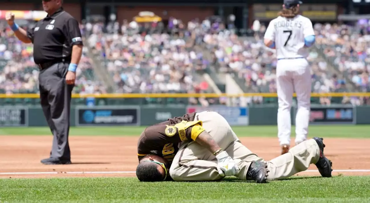 Padres' Machado leaves game vs. Rockies after hurting leg running bases