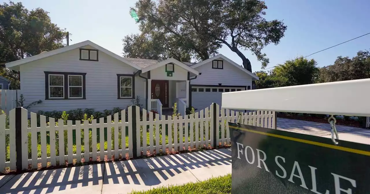 Home sales slow again as mortgage rates climb