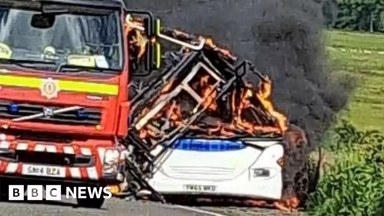 School bus catches fire after pupils evacuated