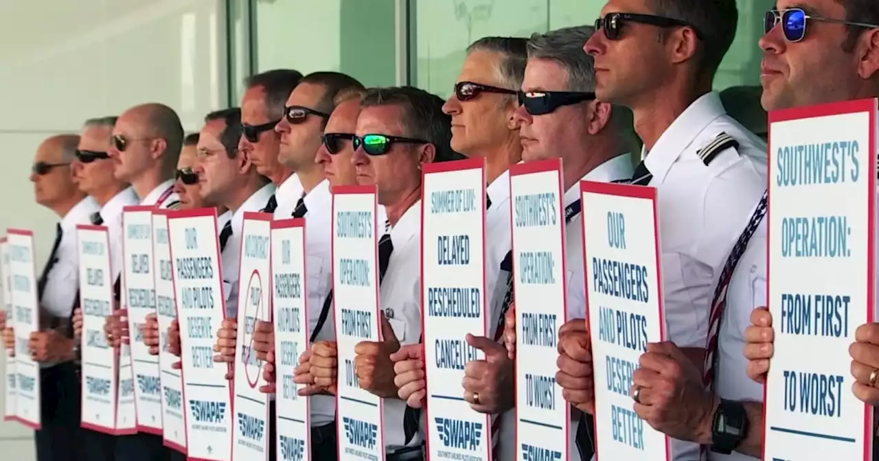 Southwest Air pilots march on picket line, say they're overworked, underpaid