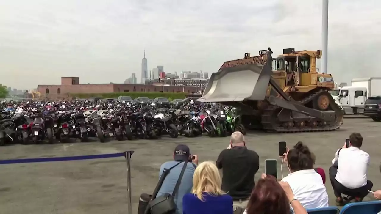 NYPD bulldozes nearly 100 illegal motorbikes and ATVs - CNN Video