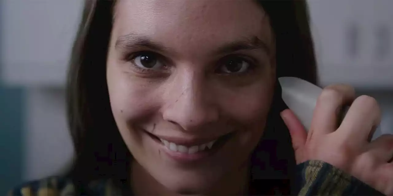 Sosie Bacon Is Haunted by Unsettling Grins in the 'Smile' Trailer